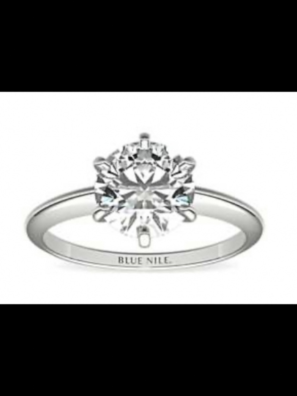 Classic six-prong 2 carat diamond engagement ring